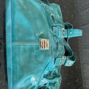 Turquoise dooney and Bourke patent leather bag